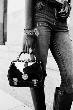 This unique "stagecoach" purse has a black and white hair on flap and the original c1890s hardware that has been polished and hand engraved. IT also features hand tooled black leather and smooth calf on the side and back. Open it to fire hydrant red suede interior. Black And White Hair, Chanel Deauville Tote Bag, Red Suede, Fire Hydrant, Hand Engraving