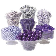 a vase filled with purple and white candy