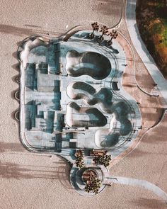 an aerial view of a water park in the middle of winter