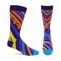 blue orange and lime green graphic socks on foot forms. Fun Multicolor Summer Socks, Fun Multicolor Socks For Spring, Casual Multicolor Fall Socks, Fun Multicolor Spring Socks, Fitted Multicolor Socks For Fall, Multicolor Retro Winter Socks, Trendy Multicolor Socks For Spring, Fitted Multicolor Summer Socks, Fun Multicolor Stretch Socks