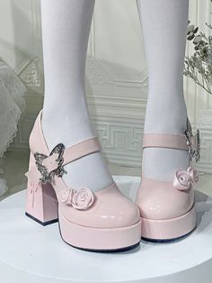 Step into a world of elegance and romance with our chunky high heel platform shoes. Adorned with roses of different sizes on the upper, these shoes bring a touch of floral sophistication to your ensemble. The specially customized butterfly rose buckle adds a unique and enchanting detail, while the intricate 3D rose engravings on both sides of the heel elevate the design to a new level of artistry. Perfect for any occasion that calls for a blend of style and grace, these shoes are a must-have for your collection.  Please note, the price includes one pair of shoes.   	 		 			Size 			34 			35 			36 			37 			38 			39 			40 			41 		 		 			Foot Length 			22 			22.5 			23 			23.5 			24 			24.5 			25 			25.5 		 		 			Heel 			3.5/11 			3.5/11 			3.5/11 			3.5/11 			3.5/11 			3.5/11 			3.5/11 			3.5 Whimsical Shoes, Steampunk Fashion Female, Steampunk Fashion Male, Gothic Skirts, Platform High Heel Shoes, Steampunk Accessories, High Heel Platform, 3d Rose, Platform Mary Janes