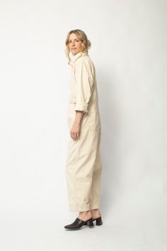 The Painter Coverall is the hardworking utility jumpsuit we have been searching for. Features side seam pockets, breast pocket and button down concealed front placket. The Painter Coverall has a relaxed fit and straight, subtly cropped leg shape. Made to be lived in and worked in and built to last. 100% Cotton Made with care in USA Machine wash, hang to dry Utility Jumpsuit, The Painter, Denim Outerwear, Vintage Wardrobe, Lace Cardigan, Knitwear Dress, Long Jumpsuits, Denim Overalls, Womens Size Chart