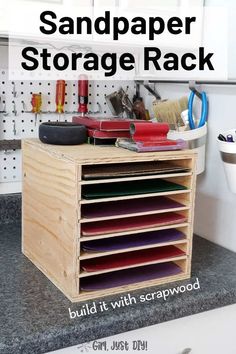 an organized storage rack in a garage with the words sandpaper storage rack on it