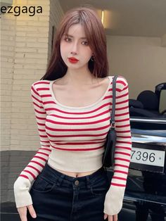 SPECIFICATIONSBrand Name: ezgagaClothing Length: short£¨4-16inch£©Material: POLYESTERMaterial: AcrylicDecoration: noneCollar: O-NeckElasticity: Medium StrecthSleeve Style: regularStyle: StreetwearPattern Type: StripedFit Type: SlimOrigin: Mainland ChinaCN: GuangdongSeason: All seasonSleeve Length(cm): FullThickness: StandardPattern: SLIMAge: 18-24Gender: WOMEN Red Slim Fit Casual Top, Red Slim Fit Tops For Fall, Y2k Fitted Crop Top For Winter, Red Fitted Y2k Crop Top, Red Y2k Style Crop Top For Spring, Trendy Red Winter Crop Top, Trendy Red Crop Top For Winter, Red Fitted Crop Top For Winter, Fitted Red Crop Top For Winter