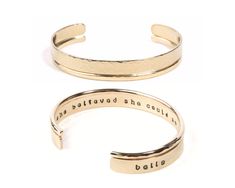 Embrace the timeless elegance of our She Believed She Could So She Did Fine Metal Bracelet Set, meticulously handcrafted to inspire and empower. Handmade with the utmost care and dedication, each piece is a testament to artisanal excellence and the unwavering spirit of achievement. Immerse yourself in the beauty of 14 karat yellow gold filled, where the iconic expression "she believed she could so she did" is precisely hand cast on the inside of the gold slim cuff, serving as a constant reminder Elegant Stamped Cuff Bracelet, Elegant Adjustable Jewelry With Engraving Option, Elegant Gold Hand Stamped Bracelets, Elegant Stamped Bracelet, Elegant Round Stamped Bracelets, Elegant Stamped Bangle Perfect For Gifts, Elegant Adjustable Bangle With Engraving Option, Elegant Stamped Bangle For Gift, Elegant Stamped Bangle As Gift