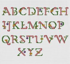 a cross stitch alphabet with letters and numbers in red, green, yellow and white