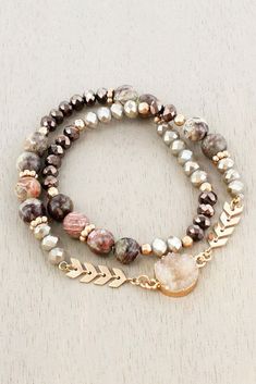 This stunning bracelet will dress up any outfit and makes a great gift.  Longer bracelet wraps twice around your wrist.  Comes in 2 colors Grey Druzy and Beige Druzy Worn Gold-Tone Chevron Design  Beads and Trim on Druzy Stone Smooth and Faceted Beads Comfort Stretch Band 4.25" Diameter Lead Compliant Measurements are approximate and beads may vary in color. Visit our e-Bay store to find more great treasures! 306 - LW & 307- LW Fashion Coffee Table Books, Stretch Band, Beaded Wrap Bracelets, Table Books, Stretch Bands, Chevron Design, Beaded Wraps, Coffee Table Books, 80s Fashion