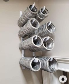 several coils are hanging on the wall