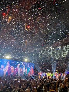 confetti is thrown in the air at a concert