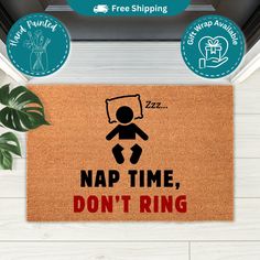 a door mat with the words nap time, don't ring and an image of a person jumping