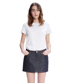 A.P.C. Women's skirt. - Fits slim due to stiffness of fabric. Please size up 1 for regular fit.- Very short cut, slightly flared.- Zipped fly and a button on the waistband engraved "A.P.C. rue Madame près du Luxembourg".- Very rigid denim that softens over time.- Caramel stitching. Classic Cotton Mini Skirt, Classic Fitted Mid-rise Denim Skirt, Classic Short Cotton Skirt, Classic Fitted Cotton Skort, Classic Fitted Cotton Mini Skirt, Classic Mini Skirt With Relaxed Fit, Classic Fitted Denim Skirt For Work, White Shirt Men, White Shirts Women