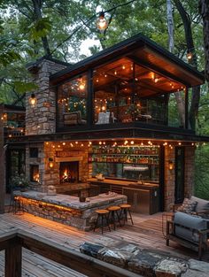 an outdoor bar is lit up by string lights on the roof and in the back