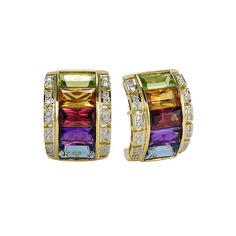 18 Karat Yellow Gold 13.5mm Wide Curved Multicolor Gemstone Earrings Featuring Amethyst, Citrine, Blue Topaz & Garnet Accented by 40 Round Brilliant Cut Diamonds of VS Clarity and G/H Color Totaling Approximately 0.20 Carats. Omega Clip Back with Pierced Post. Multicolor Gemstone Accented Earrings For Formal Occasions, Formal Multicolor Gemstone Earrings, Formal Multicolor Earrings, G H, Round Brilliant Cut Diamond, Brilliant Cut Diamond, Gemstone Earrings, Round Brilliant, Blue Topaz