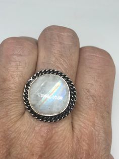 Large Vintage ring set with huge Rainbow Moonstone. Low content silver not sterling About an in long Size 8.75 can be resized at my jeweler for a $10-$20 fee All rings are shipped free in the US in a nice gift box. Check out our over a THOUSAND great reviews Engraving is $4 per letter and is not always perfect depending on the piece. It can take a few days if the jeweler is busy. This is payable to Paypal Judithsltd@gmail.com Bohemian Moonstone Ring With Large Stone, Bohemian Large Moonstone Ring, White Crystal Ring With Moon Phase, Nickel-free Spiritual Round Moonstone Ring, Nickel Free Round Spiritual Moonstone Ring, Spiritual Nickel-free Moonstone Ring, White Moon Phase Crystal Ring, Large Moonstone Spiritual Ring, Nickel-free Sterling Silver Moonstone Ring