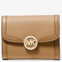 Nwt Michael Michael Kors Electric Camel/Gold Tone Hardware Medium Wallet Color: Camel Price: $79 Product Description: Wallet Coated Canvas Blend 88.92% Coated Canvas/11.08% Polyester Gold-Tone Hardware 4.75" W X 3.75" H X 1.5" D Interior Details: Back Bill Compartment, 6 Front Card Slots Lining: 100% Polyester Snap Fastening Imported 113386-01/2934 Classic Beige Wallets With Gold-tone Hardware, Brown Wallet With Gold-tone Hardware For Daily Use, Beige Wallet With Gold-tone Hardware For Everyday, Brown Wallets With Gold-tone Hardware For Daily Use, Red Wallet, Woven Handbags, Light Brown Leather, Mk Logo, Michael Kors Wallet