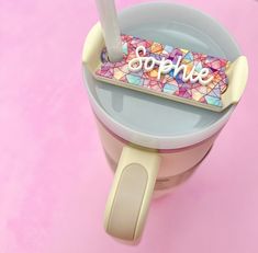 there is a cup that has some sort of ice cream in it with the word sparkle on it