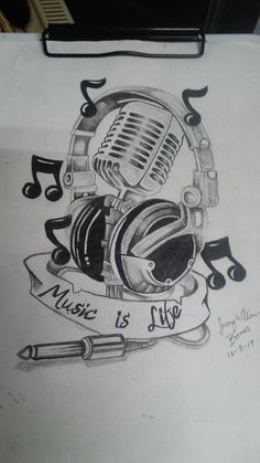 a drawing of a microphone and headphones with the words music is life on it