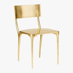 a gold chair against a white background with the seat folded back and legs bent down