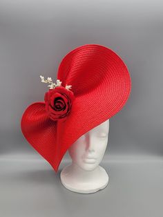 A jaw-dropping red fascinator with a floral accent.  Attached to a thin headband for ease of use.   This stunning handmade hat would be perfect for horse races, weddings, church, christening, tea parties, cocktail parties, birthdays, bridal showers, engagement parties, bachelorette parties, baby showers, Mother's Day or just because you're ready to slay. If you're interested in having Rose + Ivy design a custom hat for your occasion, please send us a message and include your desired color or a p Kentucky Derby Horses, Wedding Tea Party, Red Fascinator, Horse Races, Derby Hats Fascinators, Hat Fascinator, Horse Race, Wedding Tea, Tea Party Hats