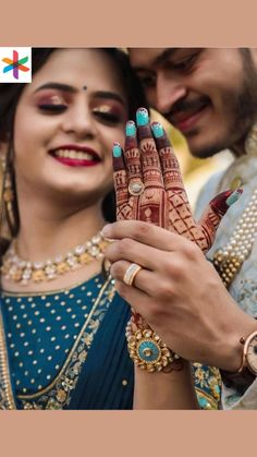 a man and woman are holding their hands together