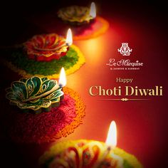 happy diwali greeting card with lit candles