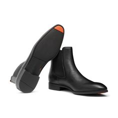 Men's black leather Chelsea boot: buy on Santoni Shoes Official Boutique, luxury handcrafted shoes and accessories since 1975. Business Chelsea Boots With Round Toe In Calf Leather, Calf Leather Chelsea Boots With Round Toe For Business, Luxury Chelsea Boots With Leather Lining And Plain Toe, Black Calf Leather Ankle Boots, Black Calf Leather Ankle Heeled Boots, Black Leather Boots With Reinforced Heel, Black High-top Chelsea Boots For Business, Luxury Calf Leather Boots With Red Sole, Leather Martin Boots With Almond Toe