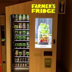 a vending machine for farmers'fridge with an advertisement on the front and side