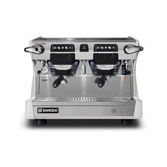 two espresso machines sitting side by side on a white background with the same machine in front of them