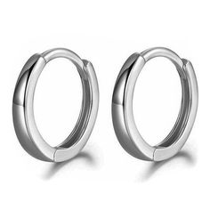 PRICES MAY VARY. Solid 925 Sterling Silver Top Quality White Gold Plating 2.5 grams Hypoallergenic 12mm outer diameter 10mm inner diameter Pure Solid 925 Sterling Silver Small Hoop Earrings for Women And Men White Gold Plated Silver Huggie Hoop Earring Lightweight Hypoallergenic 12mm PERFECT SIZE - This small huggie hoop earrings inner diameter: 10mm and outer diameter 12mm. Lightweight and easy to accessorize, these small huggie hoops looks great for any occasion. CLASSIC SIMPLE HOOP EARRING - Simple Hoop Earrings, Tiny Hoop Earrings, Silver Top, Small Hoop Earrings, Silver Tops, Huggie Hoop Earrings, Jewelry Earrings Hoops, Gold Plated Silver, Sterling Earrings