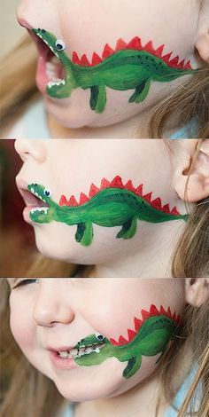 two girls with face paint painted to look like alligators