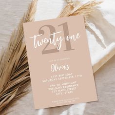 a pink 21st birthday party card with the number twenty one on it and wheat stalks