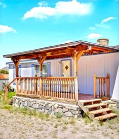 a wooden porch with steps leading up to it