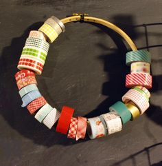 an assortment of washi tapes are arranged in a circle on a black table top