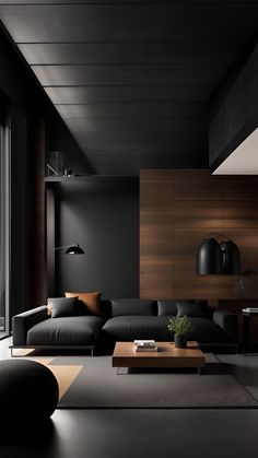 a modern living room with black furniture and wood accents