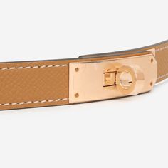 Explore Hermes' one-size-fits-all belts, perfect for everyone. These belts feature a functional, removable pouch for cards or small items like lipstick. With a smart sliding system, they can be at the waist or on the hips. Whether you prefer a classic or eclectic style, Hermes belts offer endless ways to accessorise with ease and elegance. SPL Exterior Gold Epsom leather Rose gold-tone hardware Hermès logo stamp Classic belt closure Twist lock close W stamp - 2024 production Brand new Interior M Classic Belt, Leather Rose, Hermes Belt, Prada Crossbody, Dior Shoes, Prada Crossbody Bag, Eclectic Style, Logo Stamp, Adjustable Belt