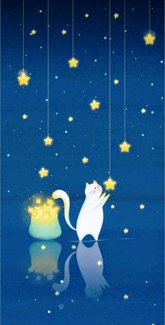 a white cat sitting on top of a table next to a pot filled with stars