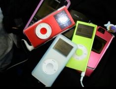 four different colored ipods sitting next to each other