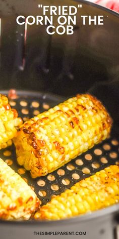 grilled corn on the cob in a frying pan with text overlay