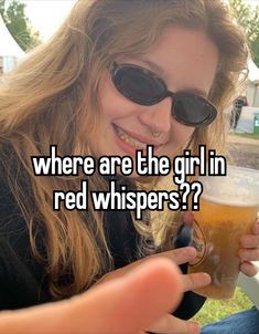 a woman holding a beer glass with the caption where are the girl in red whispers?