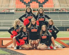 the cheerleaders pose for a team photo