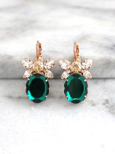 "Emerald Earrings, Bridal Drop Earrings, Swarovski Dangle Earrings, Green Crystal Earrings, Bridesmaids Earrings, Gift For Her, Emerald Drops Matching Bracelet available here: https://etsy.me/2HB7Awq Dazzling Cluster Crystal earrings feature a Baroque mirror cut crystal set in a secure prong setting. The perfect shade for cocktail parties or to add a touch of color to your wedding ensemble Petite Delights is an Official SWAROVSKI® Branding Partner Our brand is legally licensed & authorized B Bridal Drop Earrings, Emerald Earrings Drop, Bridesmaids Earrings, Emerald Green Earrings, Bridal Earrings Drop, Basic Jewelry, Bead Kits, Earrings Green, Green Crystal