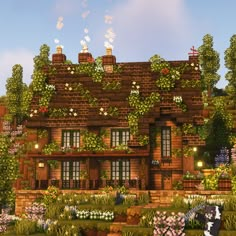 a large house with lots of flowers growing on it