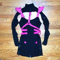 - Super Rare Vintage Lip Service Piece, From The Cyber Sniper Line (Style #26-6-00) - Comfy, Think, Slightly Stretchy Synthetic Material - Accents In Sturdy Pink / Black Plastic-Y Material - Two Pieces, A Mad Max Material Shrug + The Dress - The Shrug Has A Pink Strap Attached That Goes Around The Torso And Closes With A Buckle In The Back - The Shrug Has Open Elbows - The Shrug Could Be Worn Separately Over A Different Dress - The Shoulder Straps Are Adjustable - Full Length Zipper In The Back Punk Style Fitted Cosplay Dress, Gothic Fitted Mini Dress For Halloween, Punk Style Long Sleeve Club Dress, Emo Halloween Club Dresses, Fitted Gothic Mini Dress For Cosplay, Edgy Fitted Halloween Dress, Gothic Stretch Mini Dress For Club, Gothic Fitted Mini Dress For Costume Party, Fitted Gothic Mini Dress For Costume Party