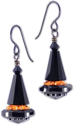 pair of black earrings with orange crystals on the bottom and silver earwires attached to them