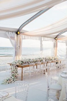 an instagram page with a table and chairs set up for a wedding reception on the beach