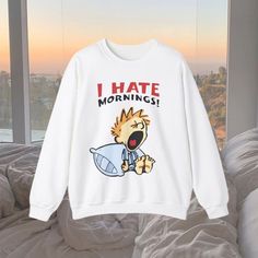 Calvin & Hobbes know the vibe, and the vibe is to HATE mornings.. This Vintage style 90s crewneck is a great graphic sweatshirt to add to any basic outfit, and also brings on the nostalgia! FAST PRODUCTION AND TURN AROUND TIME WITH A STAR SELLER RATED STORE 💖⭐ SIZING Relaxed fit - size up for a more baggy fit!   RETURN POLICY Please check our shop policies FAQ for more info!  About SUGAR FACE GOODS   💖 Woman designed, owned & operated  ⛅ Lightweight packaging  🌟 5-star rated store  📦 1-2 day Winter Hip Hop T-shirt With Letter Print, Y2k Graphic Print Sweatshirt For Streetwear, Hip Hop Crew Neck Top With Screen Print, Cotton Cartoon Print Sweatshirt For Streetwear, Casual Cartoon Print Sweatshirt For Streetwear, White Cartoon Print Sweatshirt For Streetwear, Casual Crew Neck Sweatshirt With Cartoon Print, Funny Print Crew Neck Top For Streetwear, Casual Sweatshirt With Character Print, Crew Neck