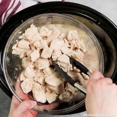 someone is mixing some food in a bowl