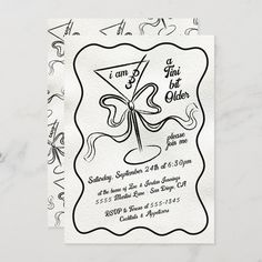 a white and black party card with an image of a martini