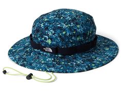 The North Face Class V Brimmer - Caps : Beta Blue Lichen Print : Ensure 360-degree sun protection to your kid's face with The North Face Class V Brimmer, featuring a cinchable cord for wet, warm, and all kinds of days. Ultraviolet Protection Factor (UPF) 40+. Wide, floatable brim for maximum sun protection. FlashDry sweatband keeps you cool and dry. Embroidered logo on external band. Chin strap with cord lock. 94% nylon, 6% elastane. Hand wash, line dry. Imported. Measurements: Circumference: 23 Casual The North Face Hats For Hiking, Casual The North Face Hats For Travel, The North Face Summer Hats For Outdoor Activities, Functional The North Face Hat For Outdoor Activities, Adjustable Green Sun Hat For Outdoor Activities, Adjustable The North Face Hats For Outdoor Activities, Adjustable Multicolor Sun Hat For Outdoor Activities, Blue Adjustable Sun Hat For Outdoor Activities, Adjustable Blue Sun Hat For Outdoor Activities