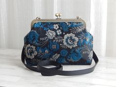 "Blue Embroidery Floral Design Crossbody bag Messenger with Adjustable Leather Strap Kiss Clasp The size of bag is about 9.5\"L x 7\"H" Mini Coin Purse, Coin Purse Wallet, Embroidery Floral, Crochet Cross, Blue Embroidery, Change Purse, Cat Face, 7 H, Colourful Fabrics